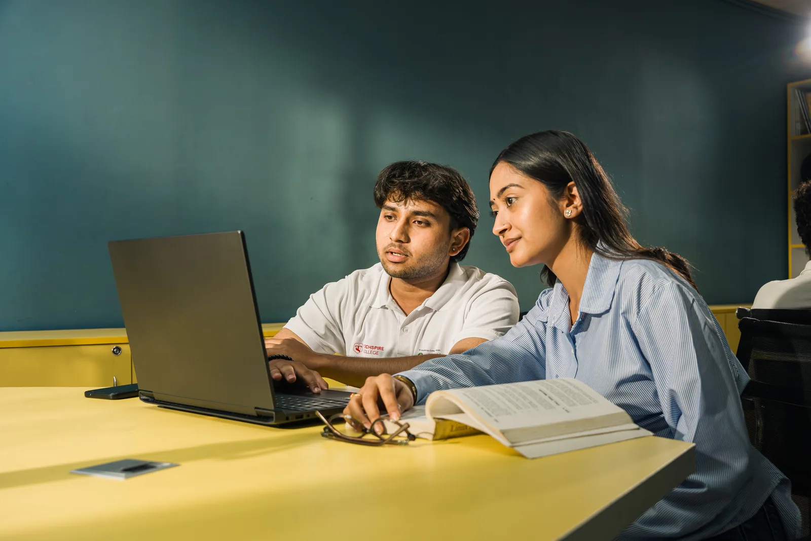 Techspire student receiving mentored support during a study session